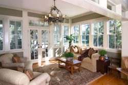 A living room with couches and tables in it