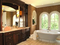 A bathroom with a shower and tub in it